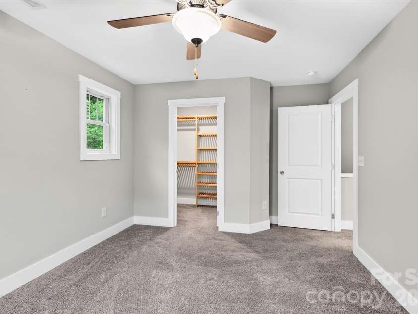 60 Wheeler Road, Weaverville, NC 28787.  MLS# CAR4404090, YatesRealty ID 37450. Comfortable Primary Bedroom With Ample Closet Space