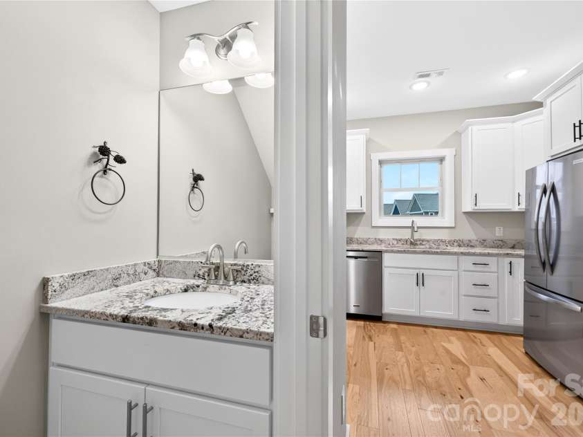 60 Wheeler Road, Weaverville, NC 28787.  MLS# CAR4404090, YatesRealty ID 37450. Convenient Main-Level Half Bath