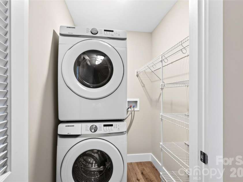 60 Wheeler Road, Weaverville, NC 28787.  MLS# CAR4404090, YatesRealty ID 37450. Laundry Space With New Stackable Washer And Dryer