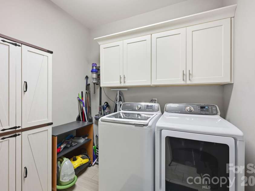 6957 Pin Oaks Drive, Denver, NC 28037.  MLS# CAR4404727, YatesRealty ID 37452. Main Level Laundry Room