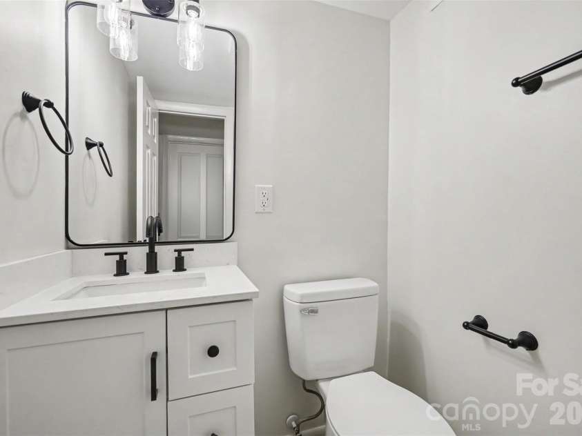 323 Whispering Pines Drive, Charlotte, NC 28217.  MLS# CAR4404610, YatesRealty ID 37453. Half bath downstairs