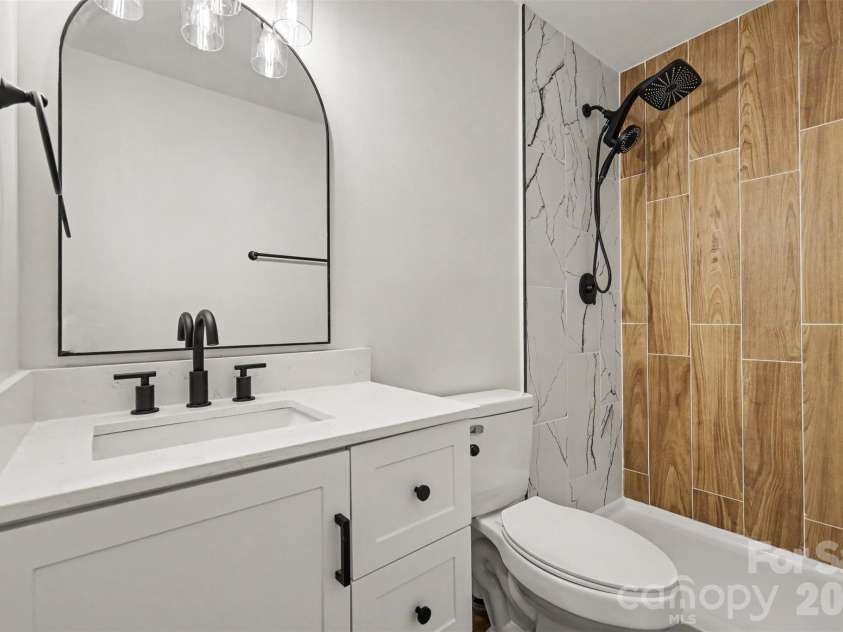 323 Whispering Pines Drive, Charlotte, NC 28217.  MLS# CAR4404610, YatesRealty ID 37453. Master bath