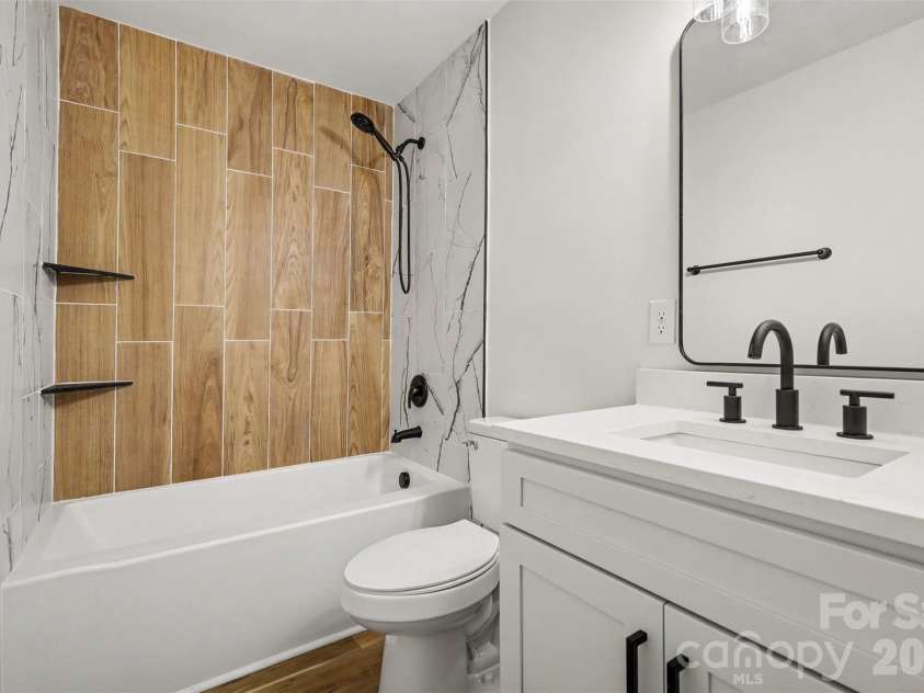 323 Whispering Pines Drive, Charlotte, NC 28217.  MLS# CAR4404610, YatesRealty ID 37453. Second full bath
