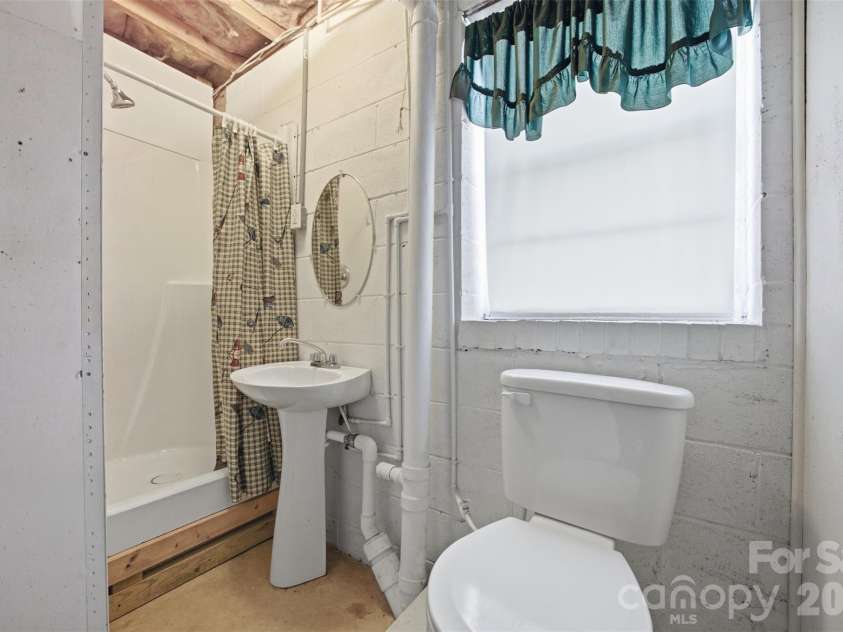 128 Old Hollis Road, Ellenboro, NC 28040.  MLS# CAR4404976, YatesRealty ID 37456. Basement Bathroom