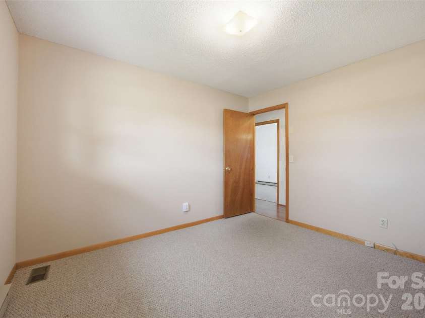 128 Old Hollis Road, Ellenboro, NC 28040.  MLS# CAR4404976, YatesRealty ID 37456. Room 1