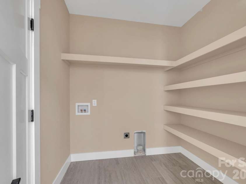 63 Abbey Lane, Hendersonville, NC 28739.  MLS# CAR4404667, YatesRealty ID 37462. Laundry off garage