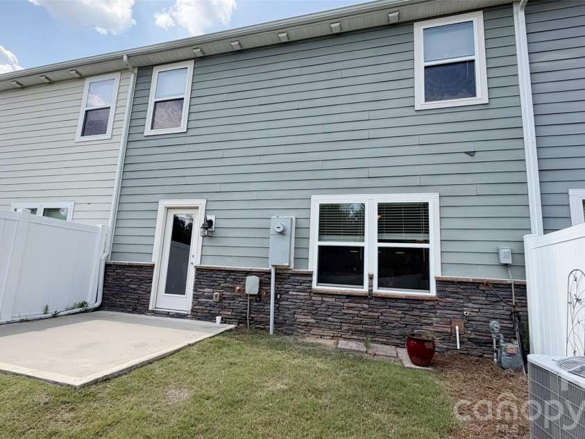 7505 Hartsfield Drive, Lancaster, SC 29720.  MLS# CAR4403879, YatesRealty ID 37478. Back patio