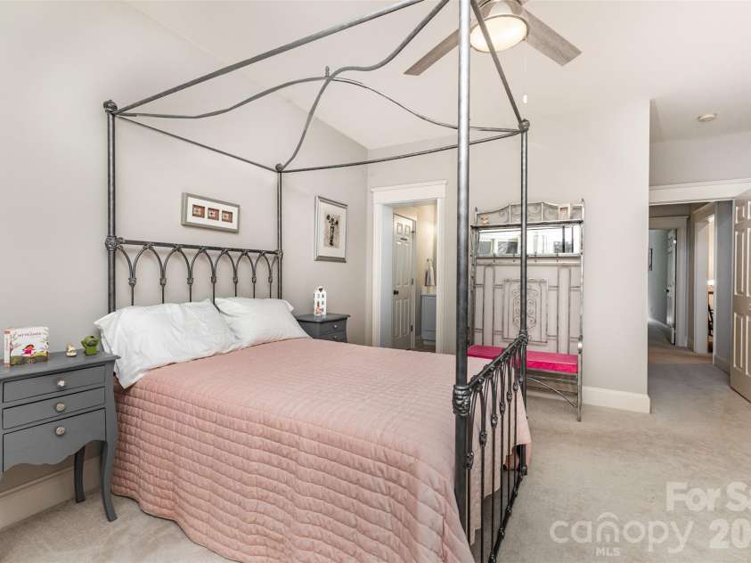 133 Brick Kiln Way, Mooresville, NC 28117.  MLS# CAR4297139, YatesRealty ID 3749. Bedroom 3 with en-suite bathroom and beautiful view of landscaped back yard