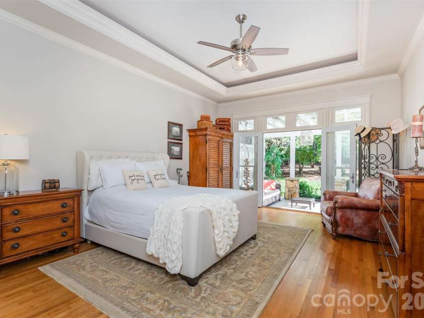 133 Brick Kiln Way, Mooresville, NC 28117.  MLS# CAR4297139, YatesRealty ID 3749. First floor Master Suite with Tray Ceiling and French Doors leading to a beautiful stone patio