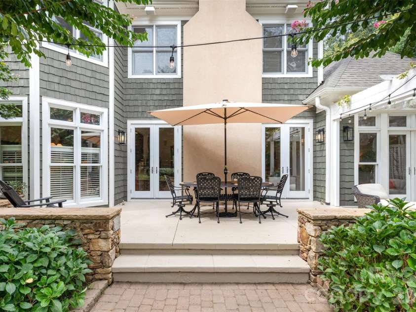 133 Brick Kiln Way, Mooresville, NC 28117.  MLS# CAR4297139, YatesRealty ID 3749. Large Stone Patio with Stone sitting Wall 