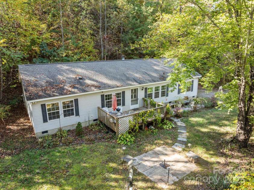 74 Davis Chapel Road, Candler, NC 28715.  MLS# CAR4311937, YatesRealty ID 3750. Usable and flat front yard