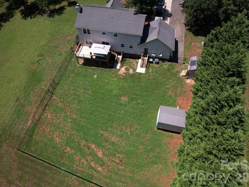 6567 Keeneland Trail, Vale, NC 28168.  MLS# CAR4404550, YatesRealty ID 37501. Aerial view back yard