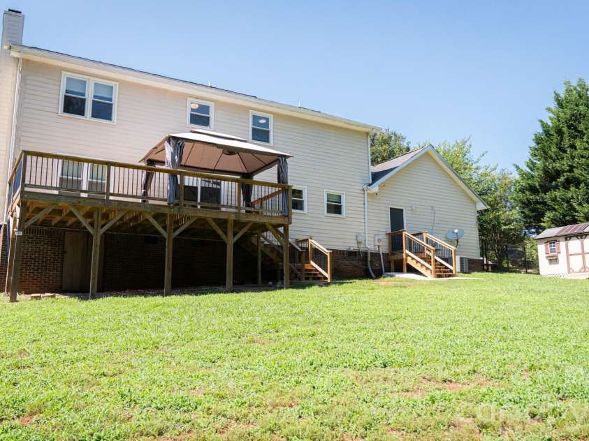 6567 Keeneland Trail, Vale, NC 28168.  MLS# CAR4404550, YatesRealty ID 37501. Back yard