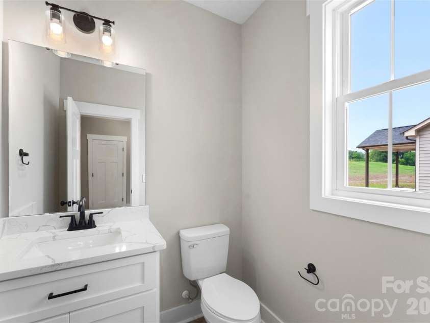 1028 Speight Road, Albemarle, NC 28001.  MLS# CAR4405298, YatesRealty ID 37504. Half Bath Down