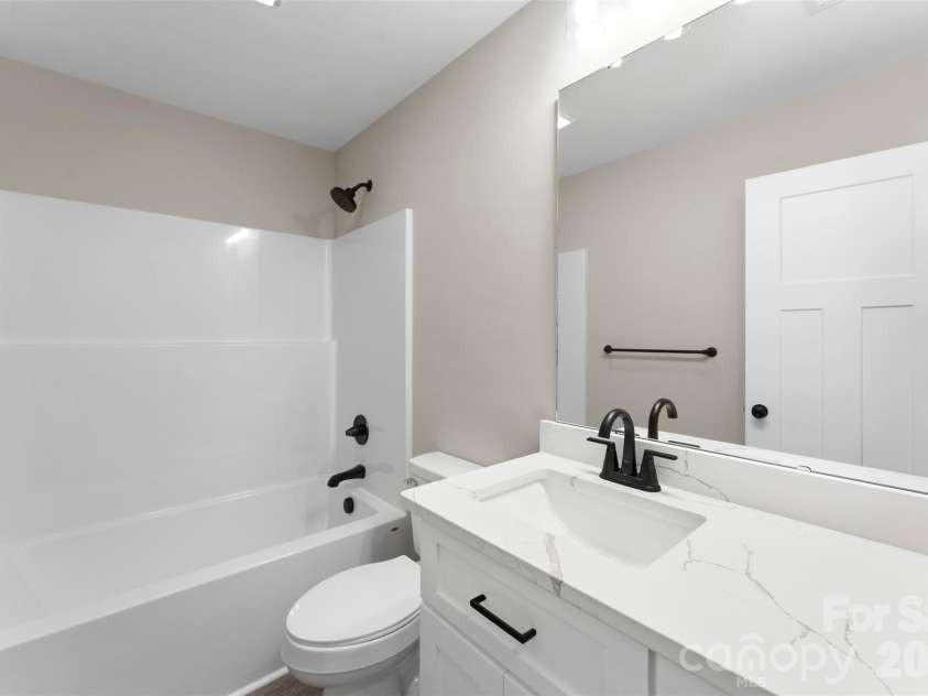 1028 Speight Road, Albemarle, NC 28001.  MLS# CAR4405298, YatesRealty ID 37504. Secondary Bathroom Upstairs