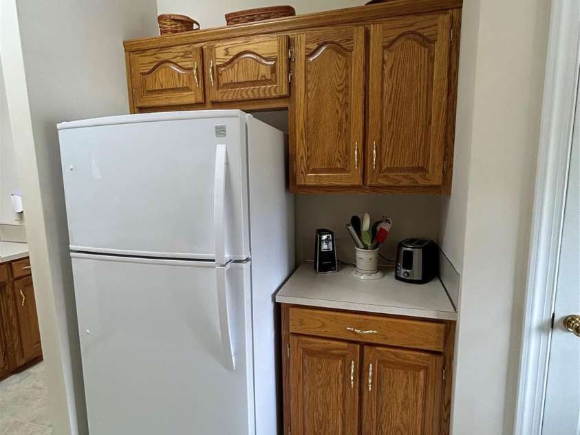 6277 Iris Court, Denver, NC 28037.  MLS# CAR4402049, YatesRealty ID 37510. Refrigerator and barista/coffee area