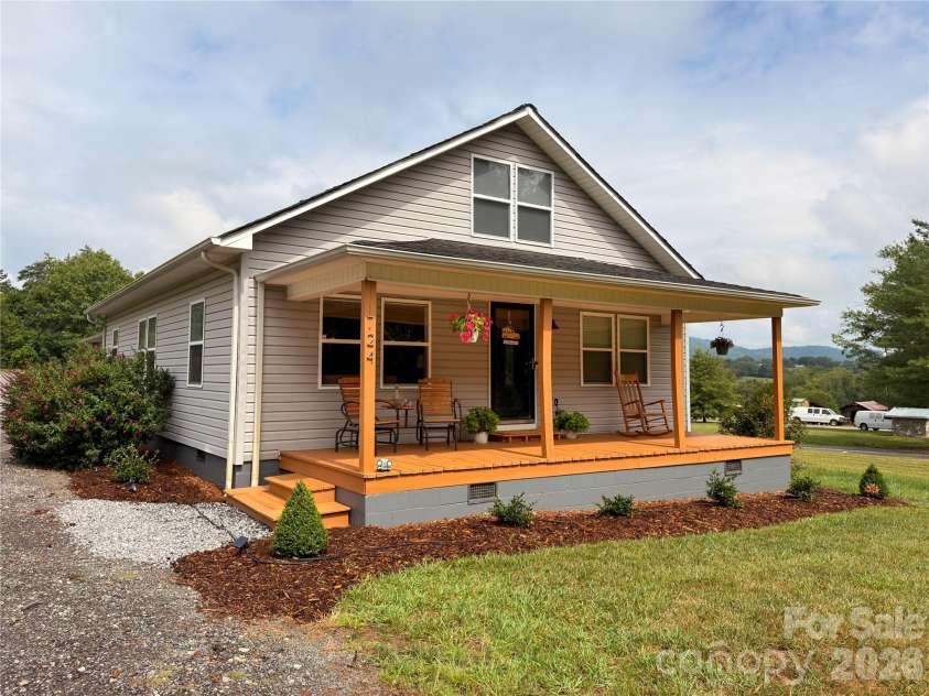 724 Johnson Farm Road, Hiddenite, NC 28636.  MLS# CAR4405354, YatesRealty ID 37515. 
