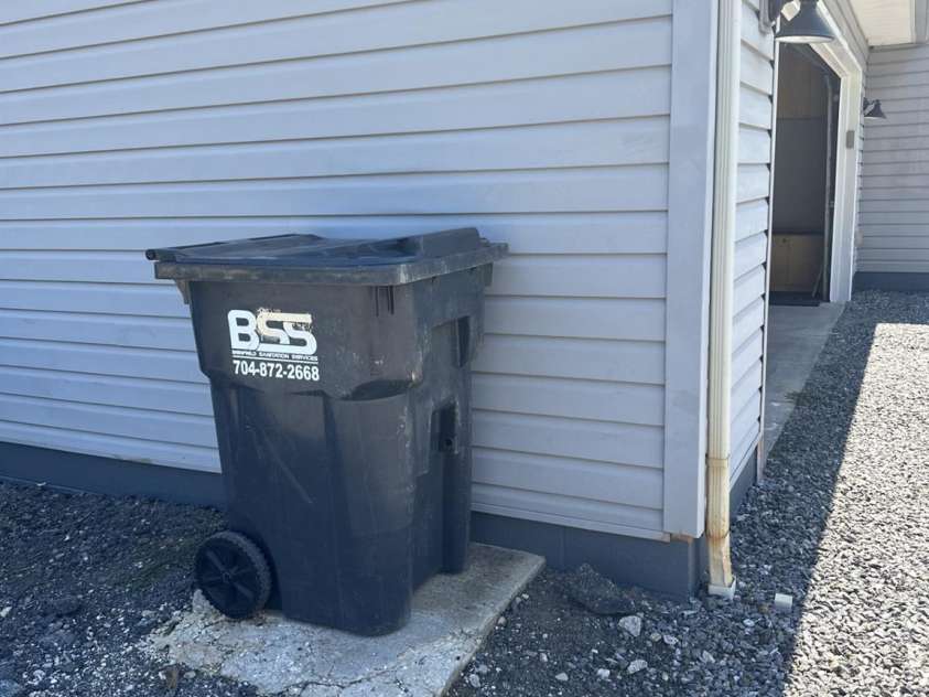 724 Johnson Farm Road, Hiddenite, NC 28636.  MLS# CAR4405354, YatesRealty ID 37515. Cement pad for Trash Can