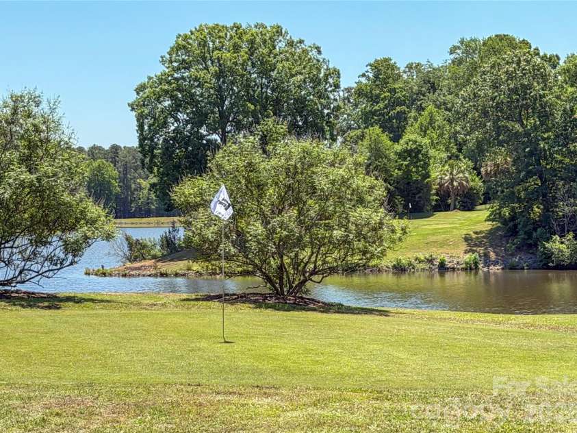 600 Baron Road, Waxhaw, NC 28173.  MLS# CAR4397562, YatesRealty ID 37517. Fun 3 hole short game practice course.
