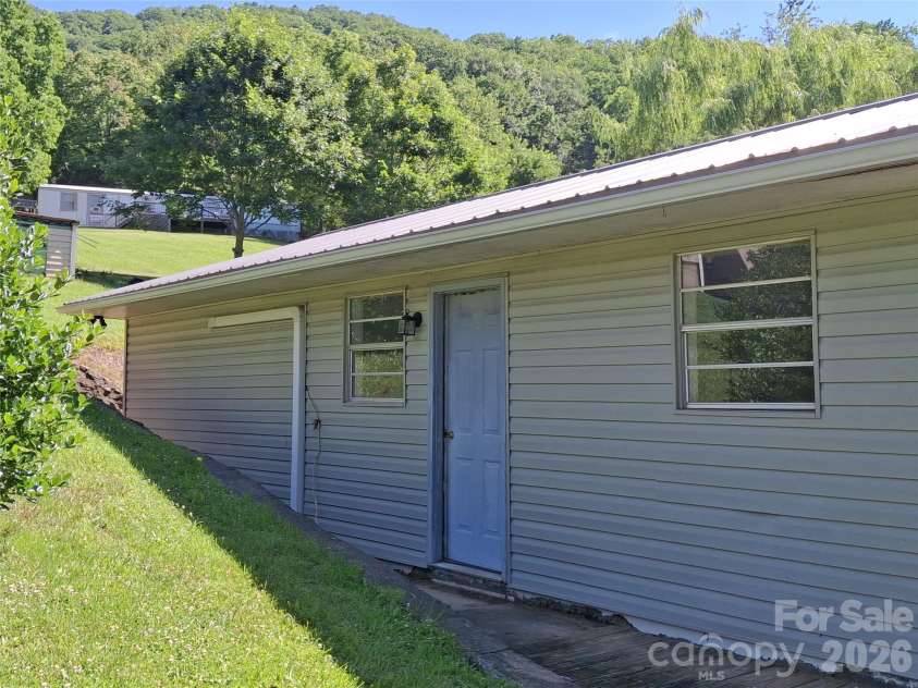 2795 Old Henson Cove Road, Canton, NC 28716.  MLS# CAR4401905, YatesRealty ID 37519. Side