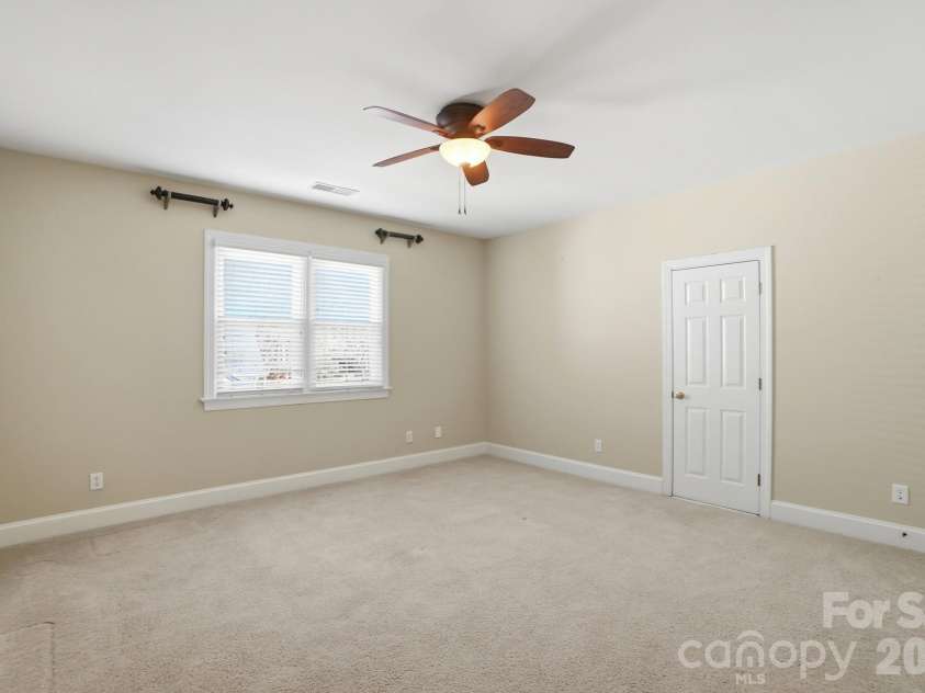 8044 Hawk Crest Court, Charlotte, NC 28270.  MLS# CAR4267919, YatesRealty ID 3752. Bedroom 4- this is the size of a second owners suite and has direct access to large unfinished storage area-could be finished or 3rd bathroom added in this area