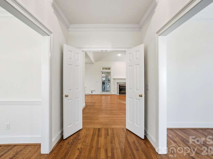 8044 Hawk Crest Court, Charlotte, NC 28270.  MLS# CAR4267919, YatesRealty ID 3752. Open foyer with site finished hardwood floors and neutral paint