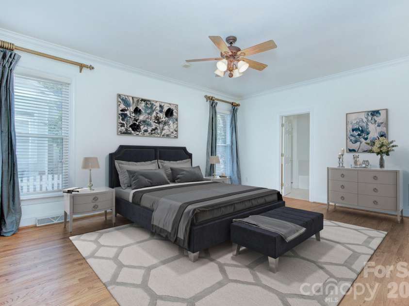 8044 Hawk Crest Court, Charlotte, NC 28270.  MLS# CAR4267919, YatesRealty ID 3752. Virtually staged-Primary bedroom on main level, site finished hardwood flooring, ceiling fan and fresh paint