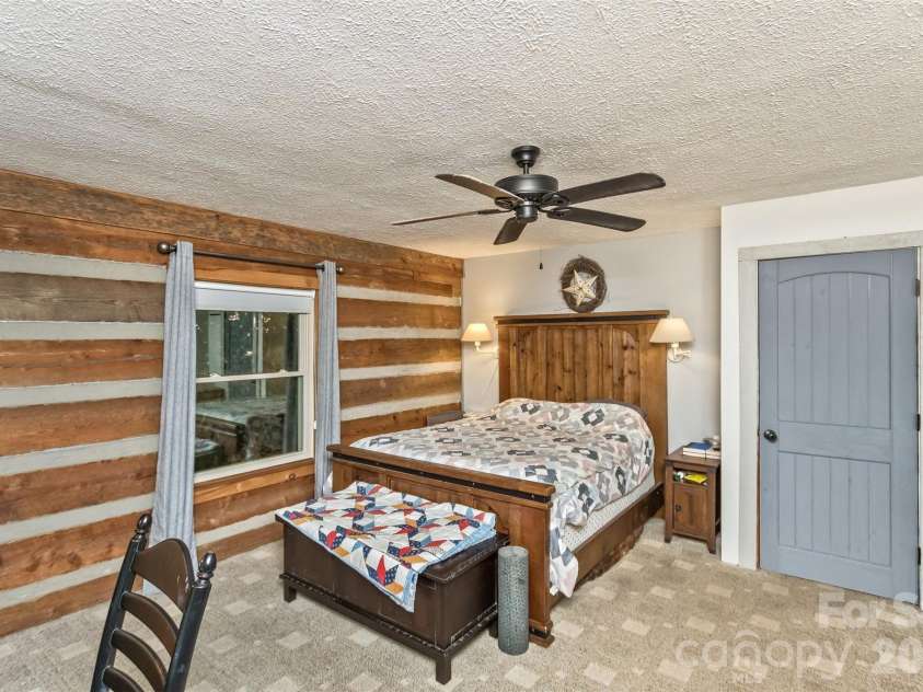 1059 Setzer Cove Road, Maggie Valley, NC 28751.  MLS# CAR4388109, YatesRealty ID 37523. Master bedroom