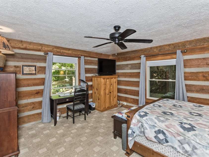 1059 Setzer Cove Road, Maggie Valley, NC 28751.  MLS# CAR4388109, YatesRealty ID 37523. Master bedroom