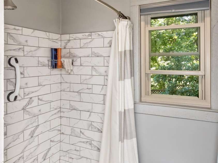 1059 Setzer Cove Road, Maggie Valley, NC 28751.  MLS# CAR4388109, YatesRealty ID 37523. Master walk in shower