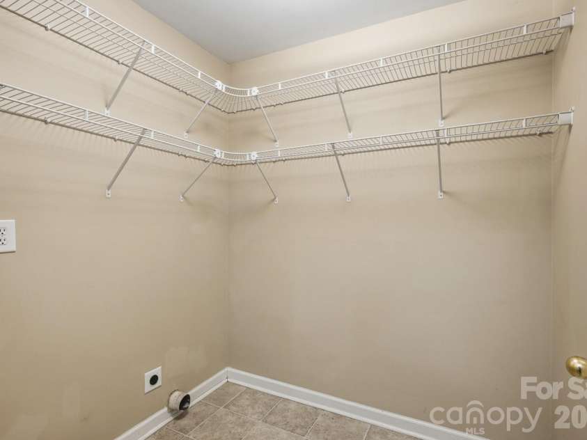 398 Knoll Court, Concord, NC 28025.  MLS# CAR4392031, YatesRealty ID 37529. Laundry Room with shelving