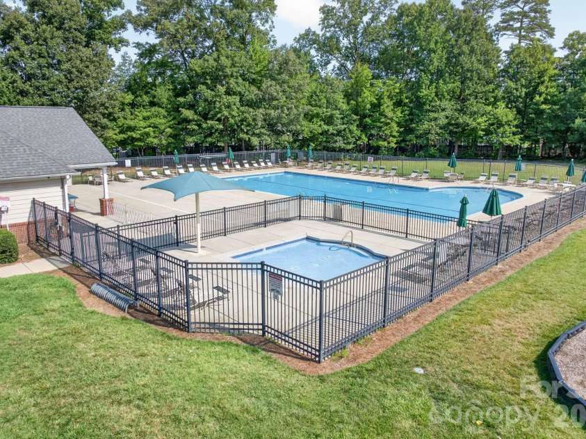 4708 Kiddle Lane, Monroe, NC 28110.  MLS# CAR4403403, YatesRealty ID 37541. Beautiful pool with separate kiddie pool