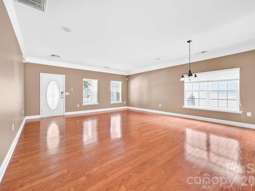 4708 Kiddle Lane, Monroe, NC 28110.  MLS# CAR4403403, YatesRealty ID 37541. Looking toward the front door. Look at those floors glisten