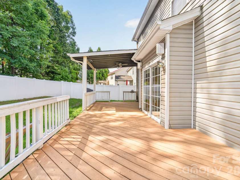 4708 Kiddle Lane, Monroe, NC 28110.  MLS# CAR4403403, YatesRealty ID 37541. Open area deck. Best of both worlds