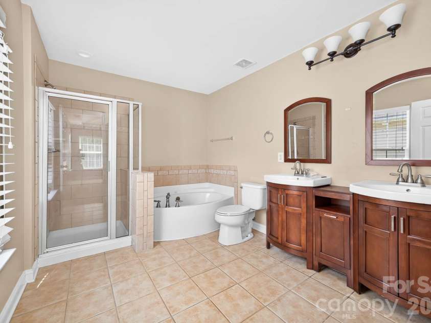 4708 Kiddle Lane, Monroe, NC 28110.  MLS# CAR4403403, YatesRealty ID 37541. Primary bath with separate tub & shower