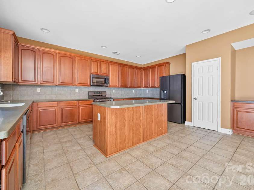 4708 Kiddle Lane, Monroe, NC 28110.  MLS# CAR4403403, YatesRealty ID 37541. Refrigerator remains