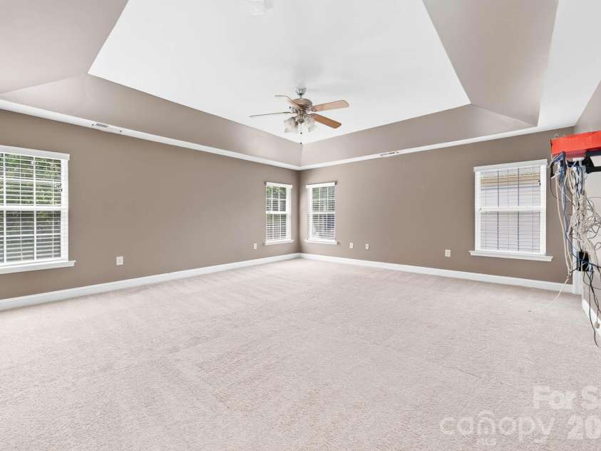 4708 Kiddle Lane, Monroe, NC 28110.  MLS# CAR4403403, YatesRealty ID 37541. The primary bedroom is very large