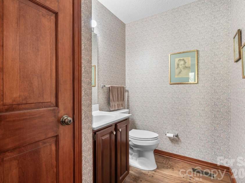 48 Stony Ridge, Asheville, NC 28804.  MLS# CAR4397346, YatesRealty ID 37545. Half bath off of the den.