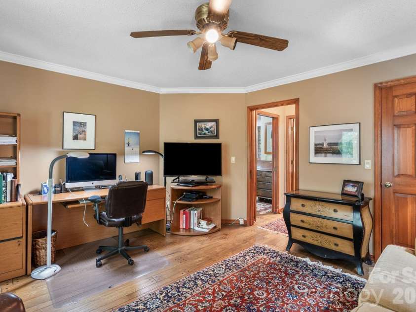 48 Stony Ridge, Asheville, NC 28804.  MLS# CAR4397346, YatesRealty ID 37545. Pocket doors in the hall make the second bedroom a dedicated suite with bath.