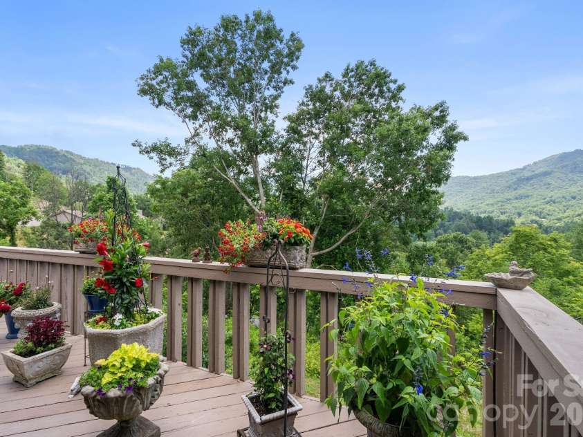 48 Stony Ridge, Asheville, NC 28804.  MLS# CAR4397346, YatesRealty ID 37545. Stunning mountain views await.