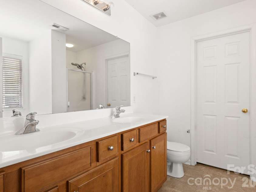 3102 Broad Plum Lane, Indian Trail, NC 28079.  MLS# CAR4401259, YatesRealty ID 37558. En suite bathroom
