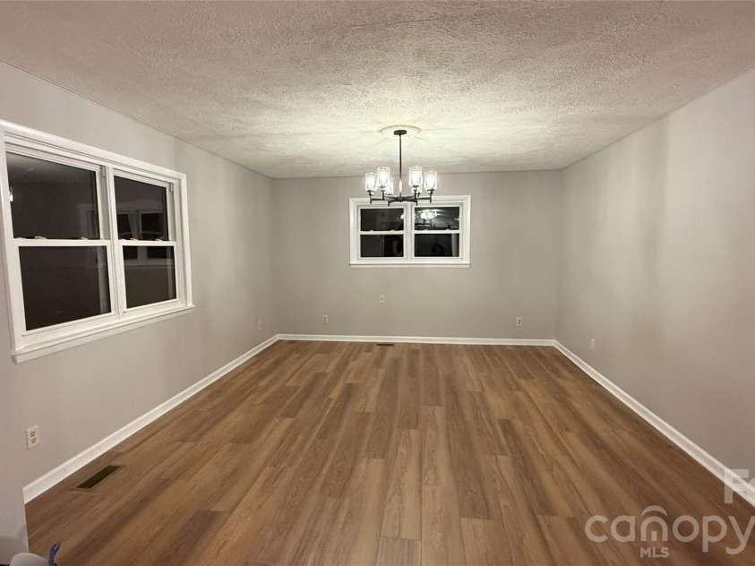 210 Bleynat Street, Valdese, NC 28690.  MLS# CAR4393221, YatesRealty ID 37559. Living room