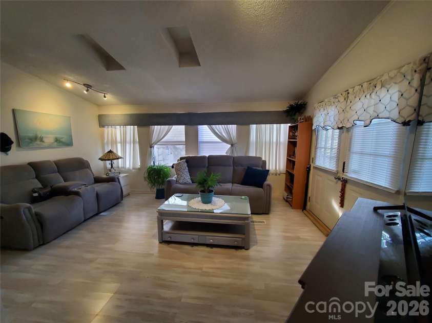 101 Cardinal Drive, New London, NC 28127.  MLS# CAR4340297, YatesRealty ID 3756. Living Room