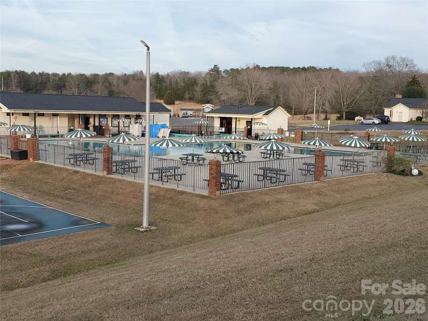 101 Cardinal Drive, New London, NC 28127.  MLS# CAR4340297, YatesRealty ID 3756. Pool