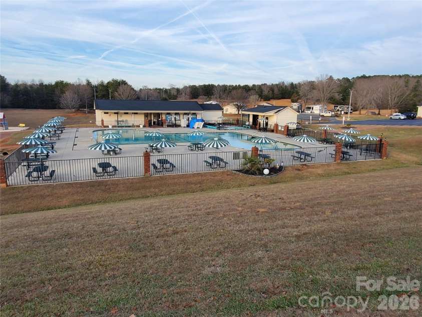 101 Cardinal Drive, New London, NC 28127.  MLS# CAR4340297, YatesRealty ID 3756. Pool