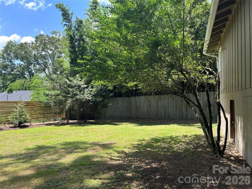 11 Mountain Road, Hendersonville, NC 28791.  MLS# CAR4400535, YatesRealty ID 37562. Backyard