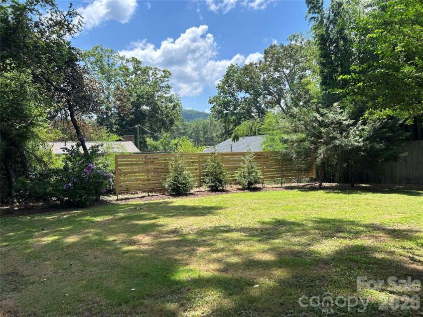 11 Mountain Road, Hendersonville, NC 28791.  MLS# CAR4400535, YatesRealty ID 37562. Backyard