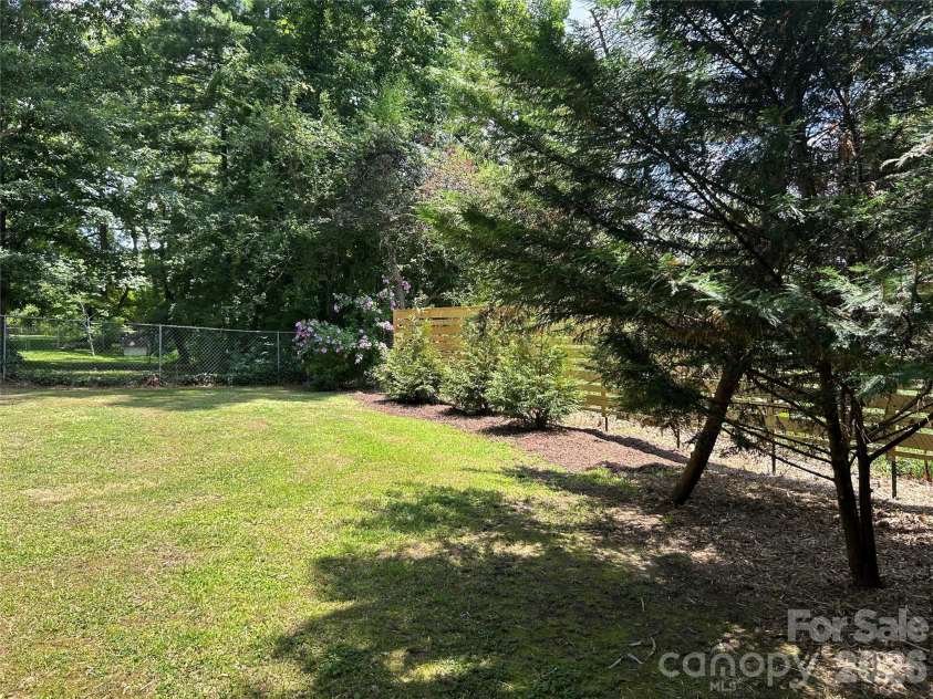 11 Mountain Road, Hendersonville, NC 28791.  MLS# CAR4400535, YatesRealty ID 37562. Backyard