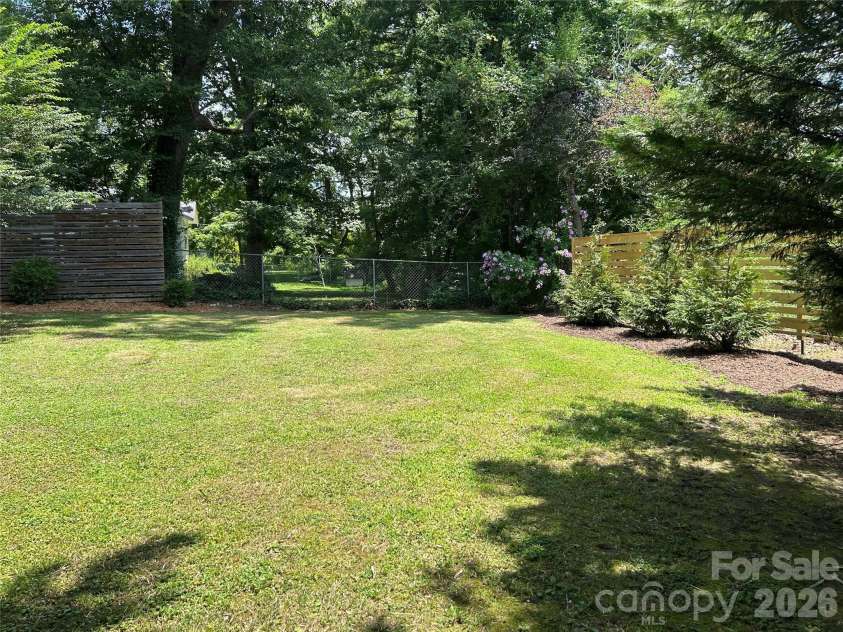 11 Mountain Road, Hendersonville, NC 28791.  MLS# CAR4400535, YatesRealty ID 37562. Backyard