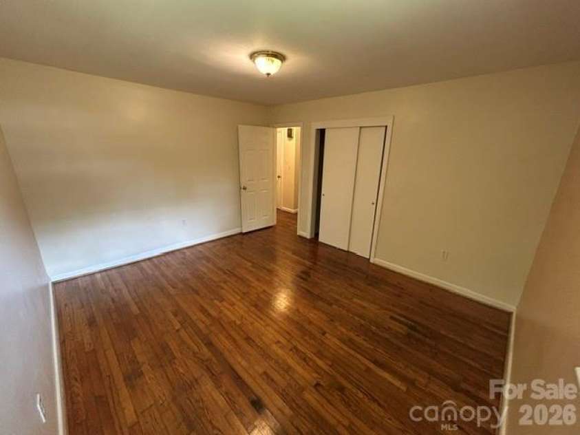 11 Mountain Road, Hendersonville, NC 28791.  MLS# CAR4400535, YatesRealty ID 37562. Primary Bedroom